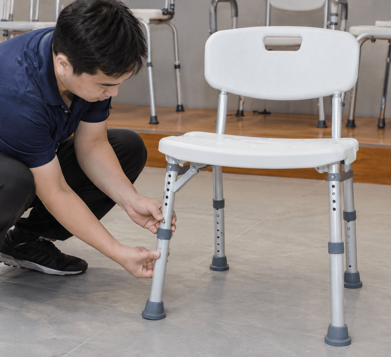 Technician checking height and folding locks